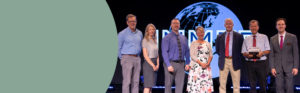 Group recognized during an organizational awards presentation.