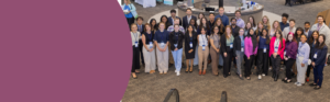 A group of healthcare profession students posing for a photo.