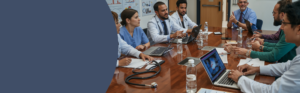 Healthcare professionals participating in a leadership and management meeting.
