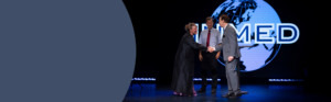 Graduate degree ceremony for healthcare professionals completing advanced study in international health.