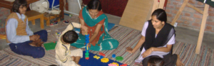 Community health workers engaging families in an educational outreach activity.