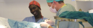 Surgical care being provided in a hospital operating room.